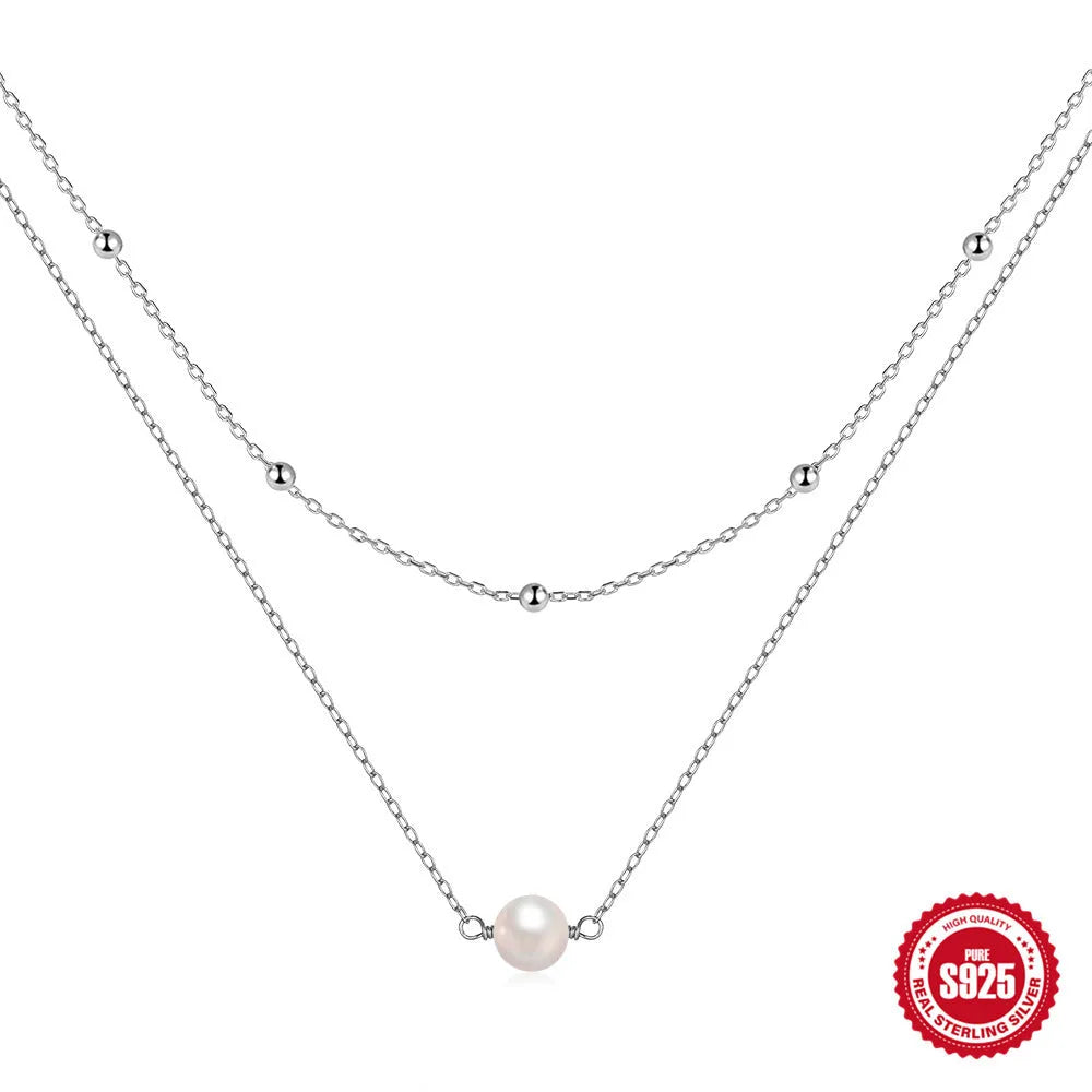 S925 sterling silver double layer necklace with twin pearl accents in gold colour