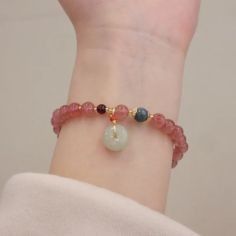 Strawberry quartz bracelet with Chinese purse charm and Hetian jade accents
