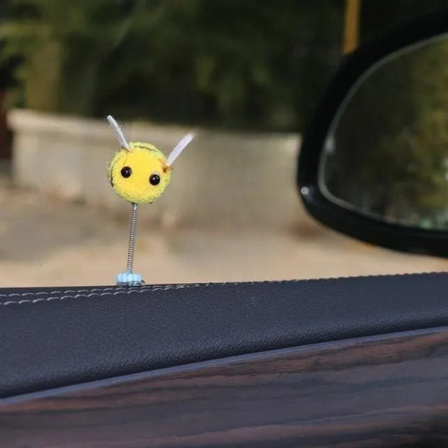 Swing Spring Bee car decoration showing a small, soft fur ball bee on a 3cm by 3cm scale.