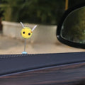Swing Spring Bee car decoration showing a small, soft fur ball bee on a 3cm by 3cm scale.