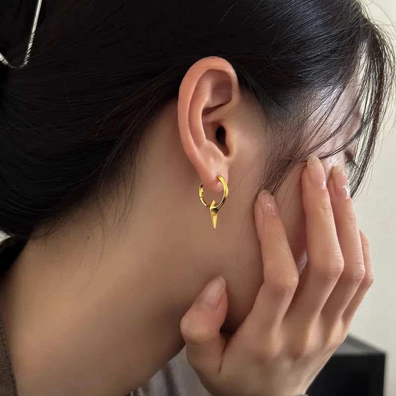 Geometric star-shaped ear clips for women with electroplated platinum finish on copper