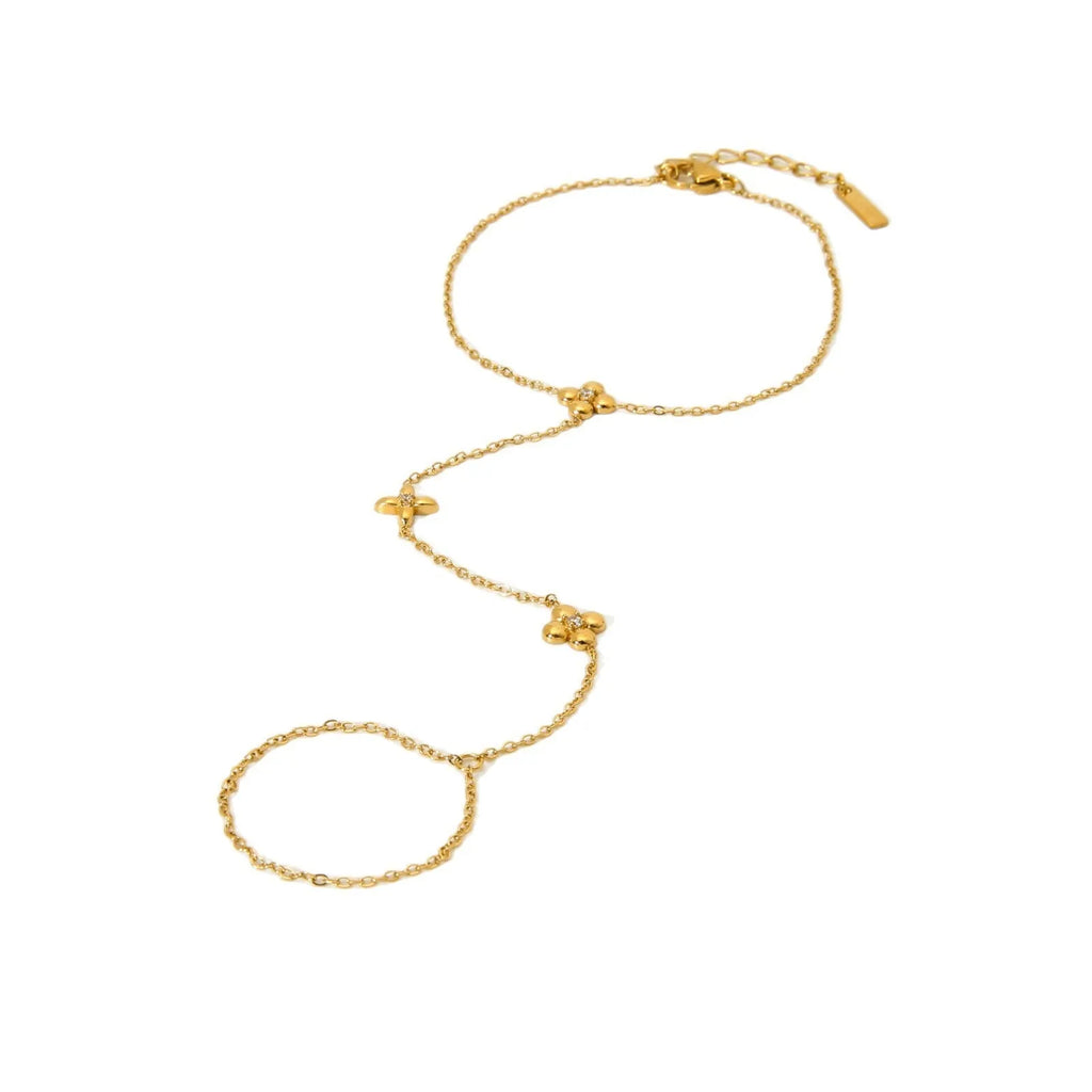 Gold-coloured women's bracelet with geometric flower and eight-pointed star design