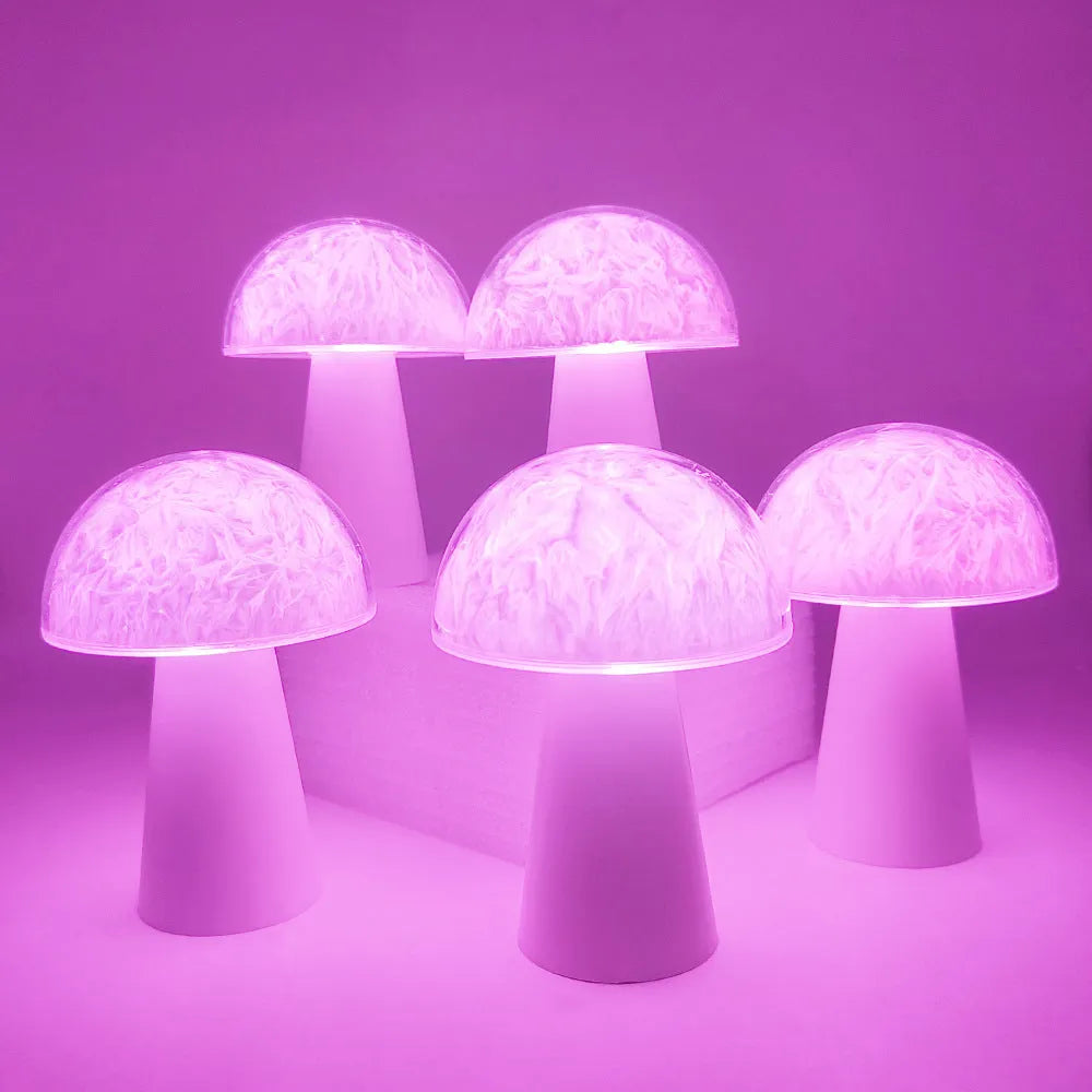 Mushroom-shaped RGB colour-changing ambience light with remote control on wooden surface