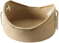 Woven wicker cat bed basket with corrugated scratching board interior for feline resting and claw maintenance