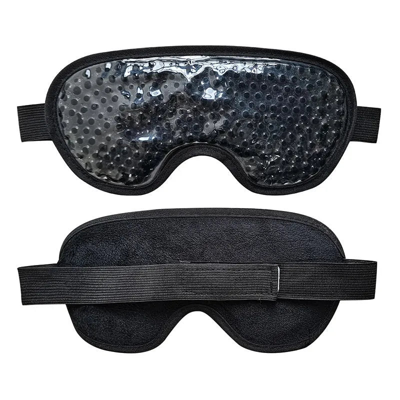 White rechargeable portable eye compress device with USB cable and eye mask.