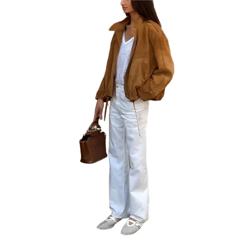 Man wearing a solid colour retro-style loose-fit polyester jacket.