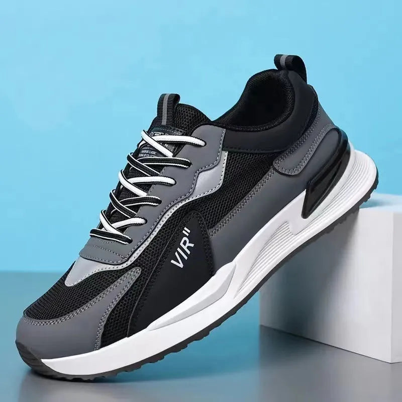 Men's colour block mesh lace-up running shoes in black, grey and white on a white background.