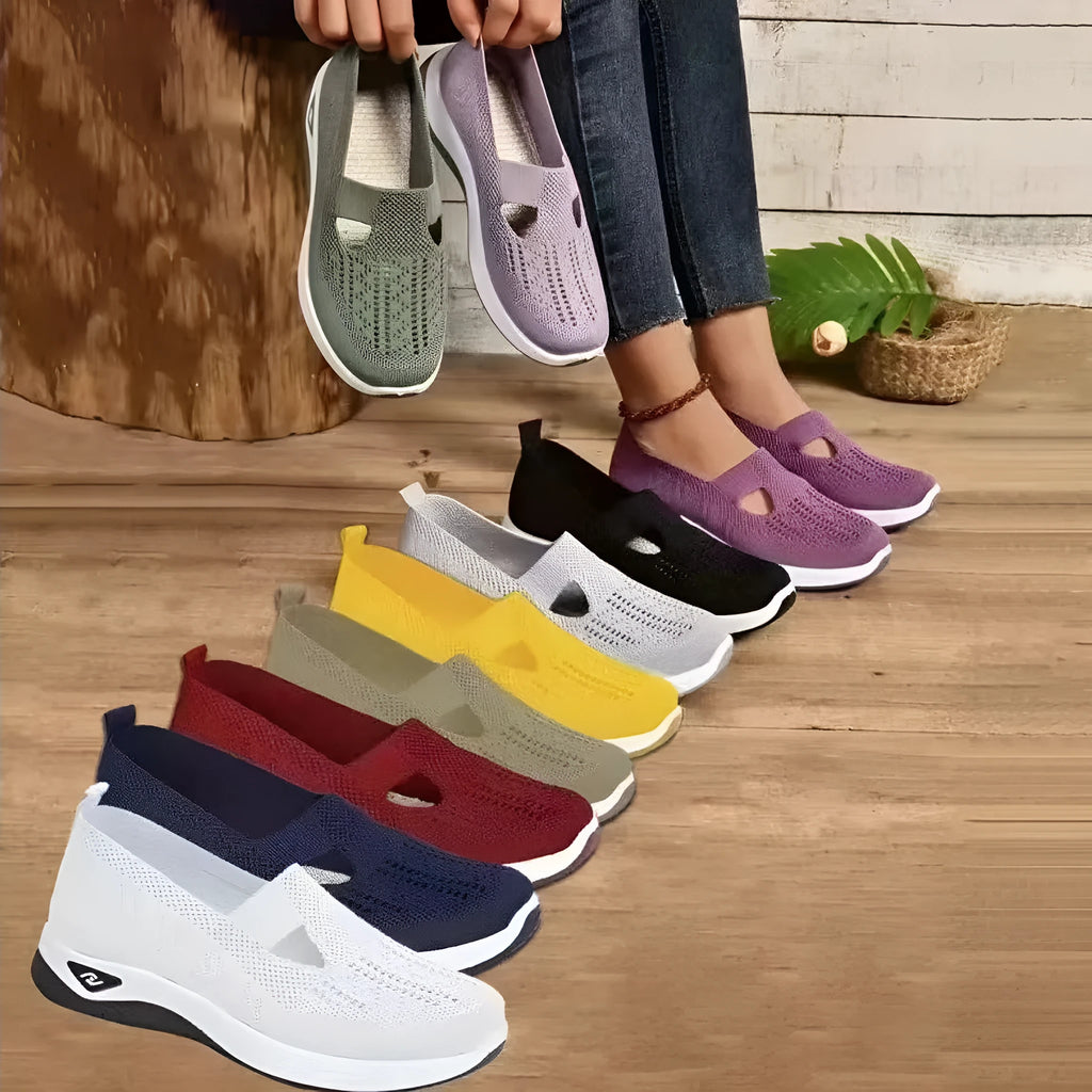 Pair of low top casual mesh shoes with T-strap and soft PVC sole in solid colour for elderly women