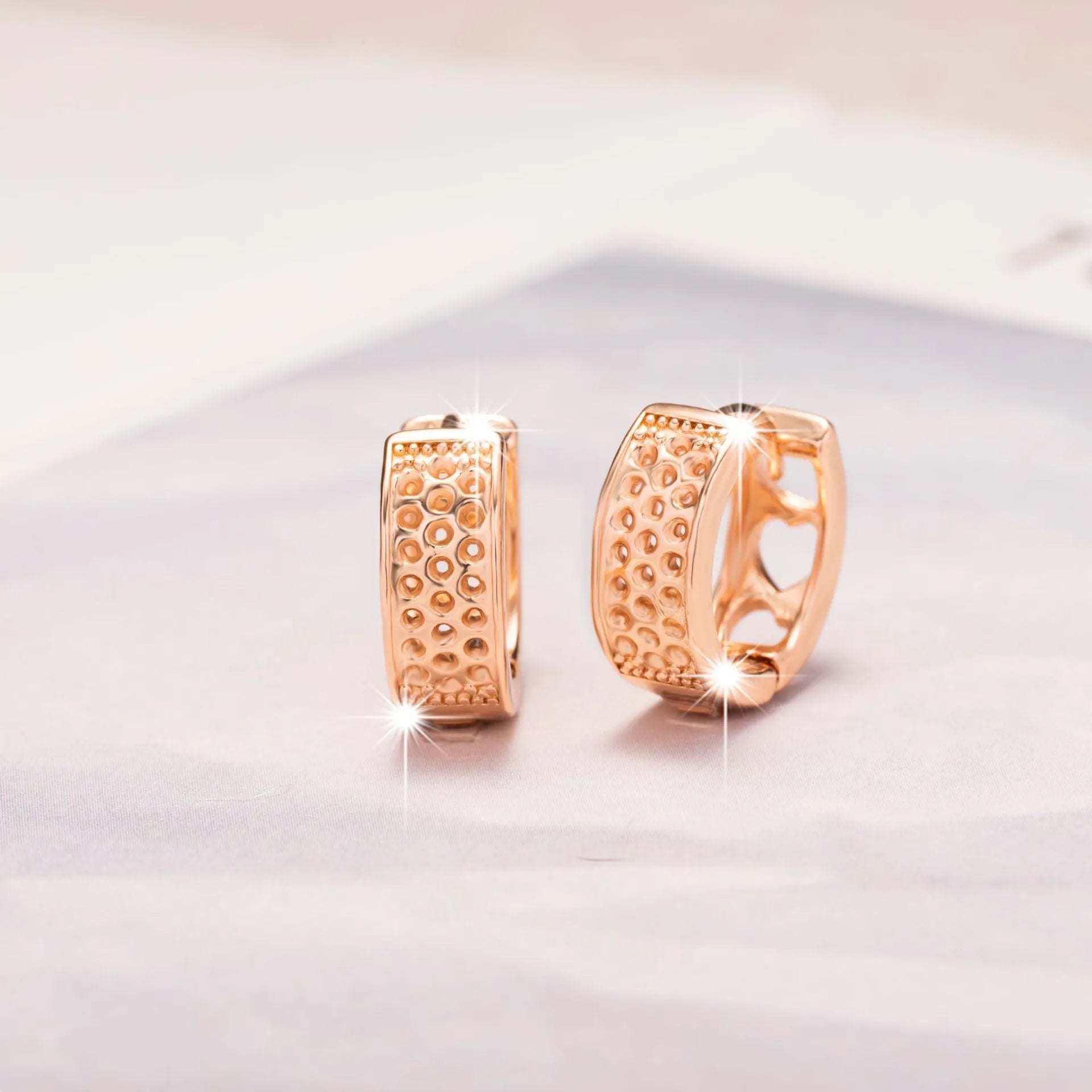 Rose gold hollowed heart earrings with circular outline for women