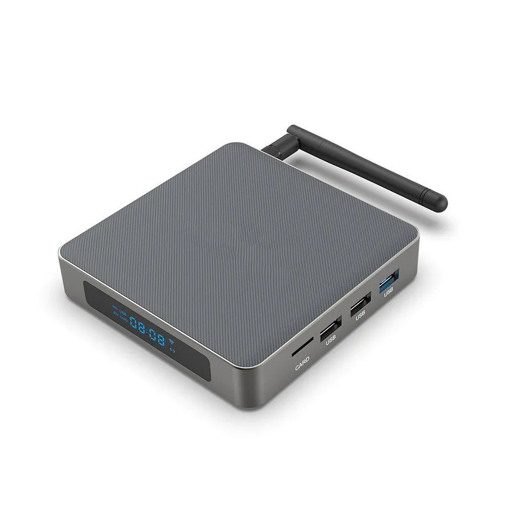 Black Android set-top box with HDMI port, measuring 105x105x20mm, beside its remote control and power adapter.