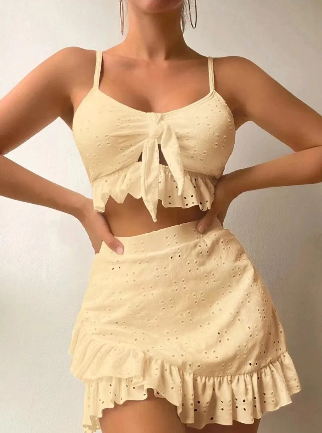 Women's three-piece bikini swimsuit with split hip skirt in solid colour options