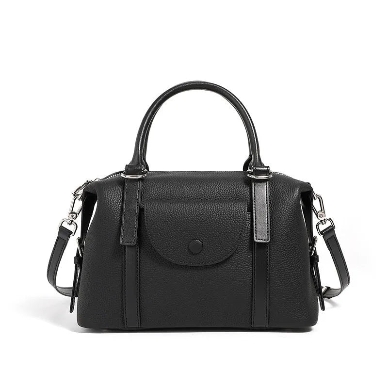 Genuine leather ladies handbag with contrast stitching and lock detail in elephant grey colour
