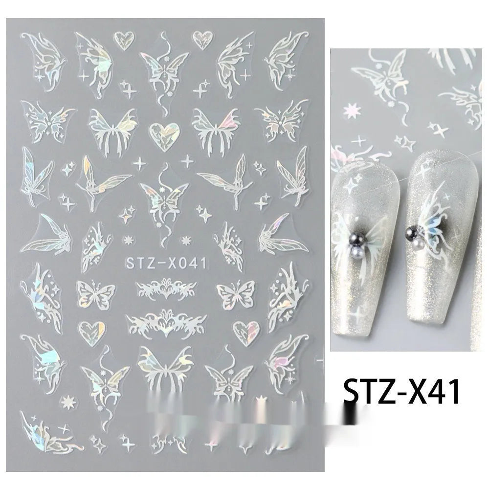 Cartoon love pattern nail art sticker decals in black and silver colours on a plastic sheet.