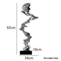 Abstract still life decorative sculpture in natural resin with metallic finish