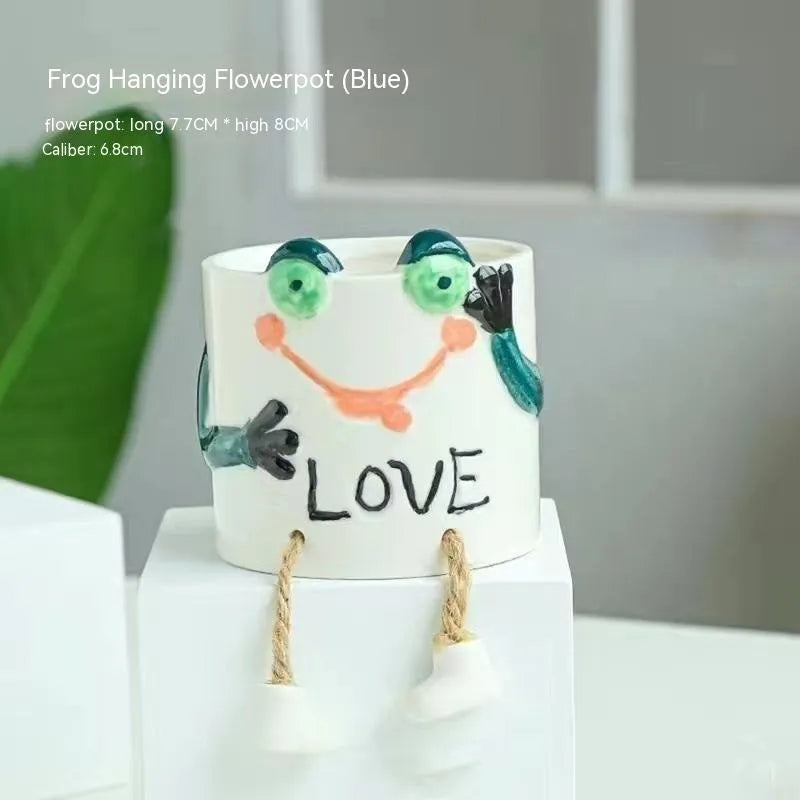 Ceramic hanging foot flowerpot for succulent plants in cartoon style with twelve colour variations on desktop