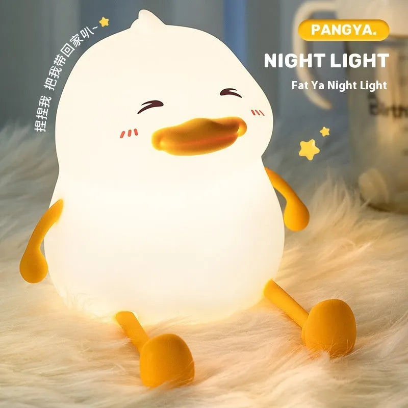 Chubby silicone pet night light desk lamp with integrated phone holder showing dimensions 108x104x128mm