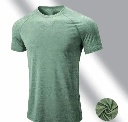 Man wearing a tight-fitting green casual short-sleeve t-shirt with a round neck.
