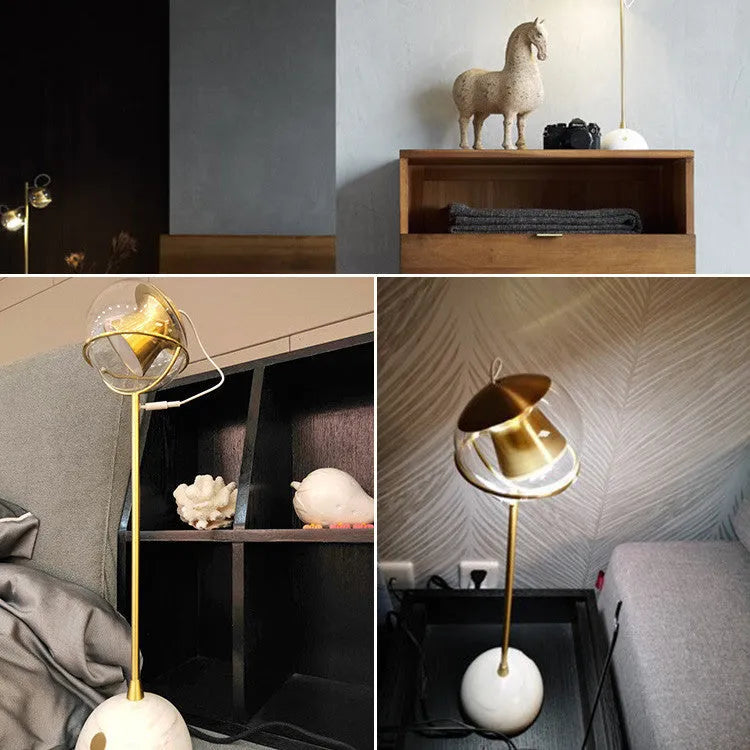 Modern glass desk lamp with a dimmable LED light source and touch switch.