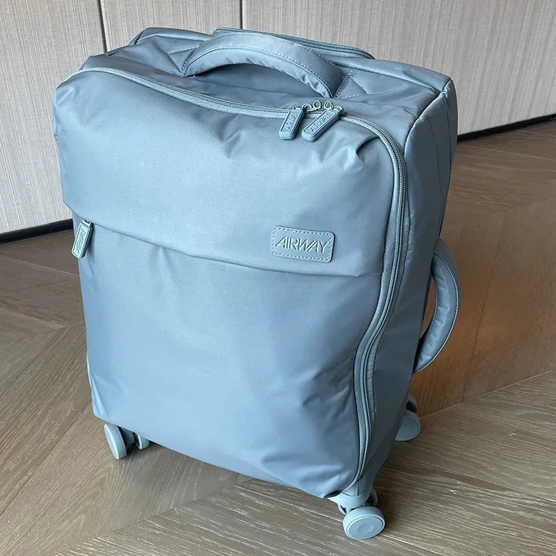 20 inch waterproof Oxford cloth suitcase in bluestone green colour with universal wheels