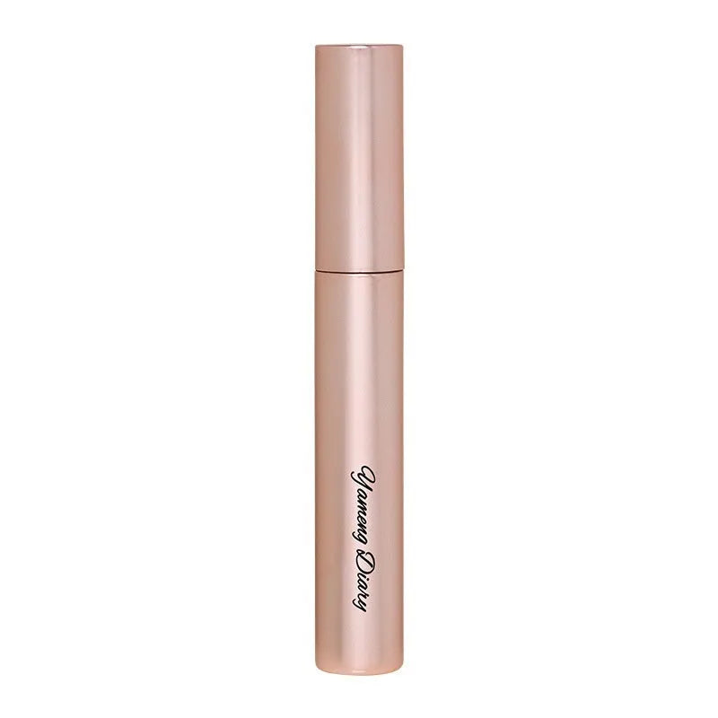 Long curling mascara tube in black or brown with long-lasting setting formula