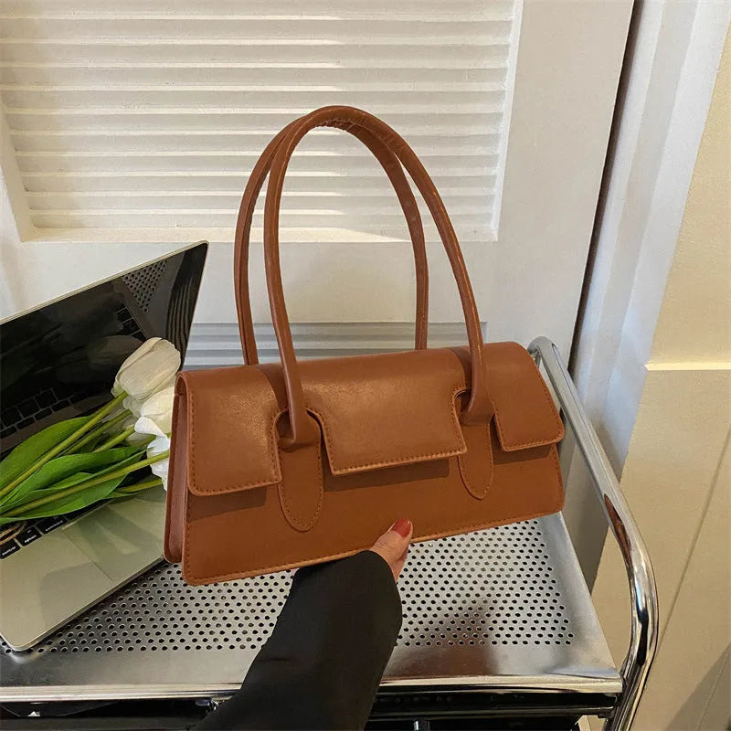 Women's small square shoulder bag in PU leather with stitching details and single strap