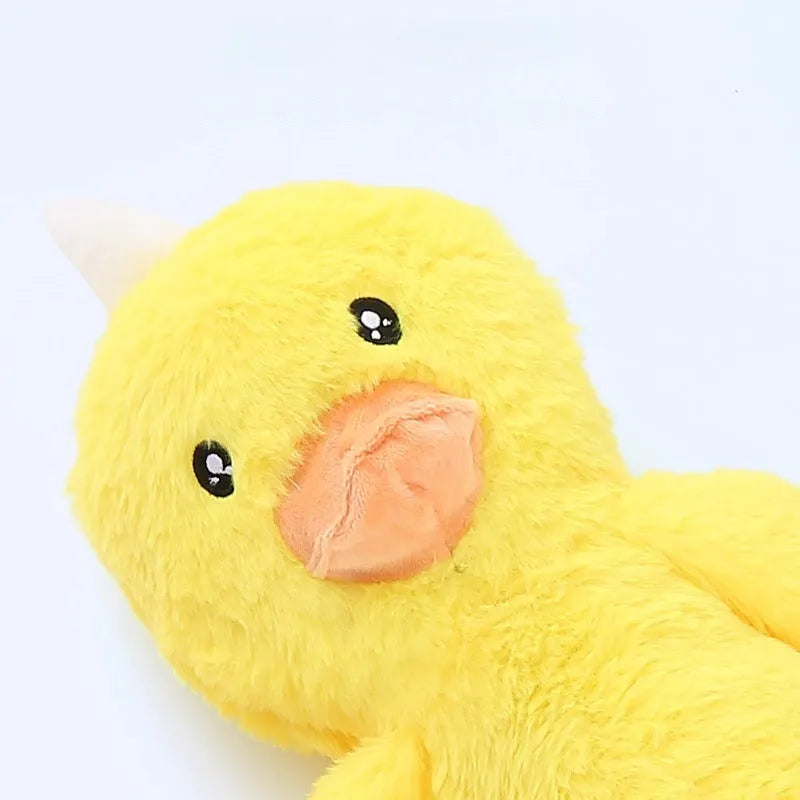 Large pink and yellow plush dog toy with squeaker and rattle paper for golden retriever chewing