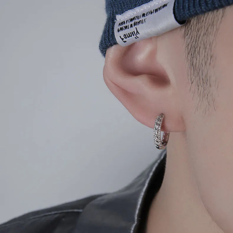 Silver geometric men's earrings made from copper, shown in 10mm and 14mm sizes as both single pieces and pairs.