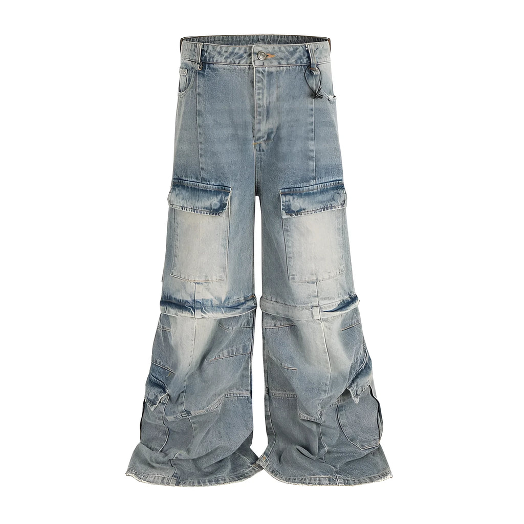 Black washed-out cotton overalls on a hanger, showing detachable pockets and a zip fly.