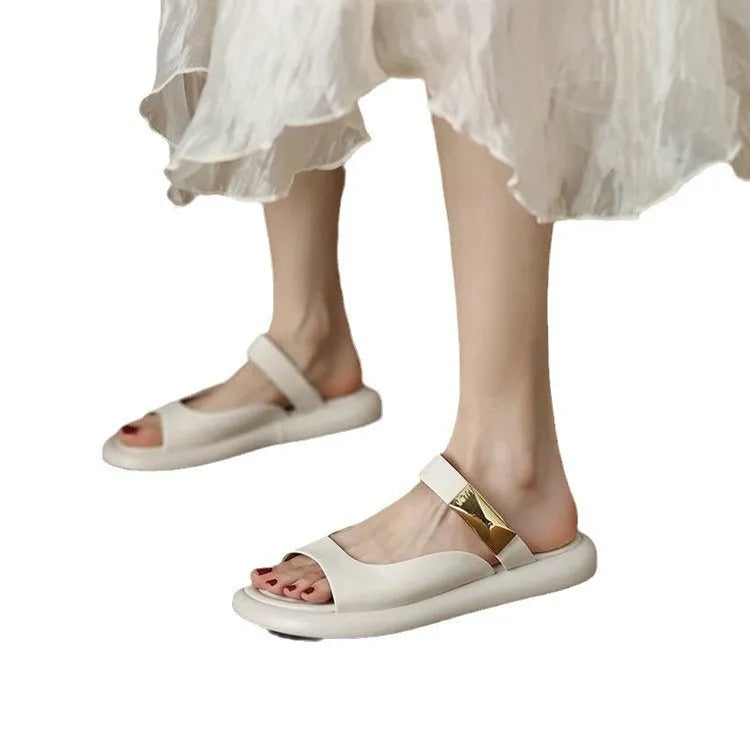 Women's apricot peep toe flat platform sandals with a soft leather upper and rubber sole.