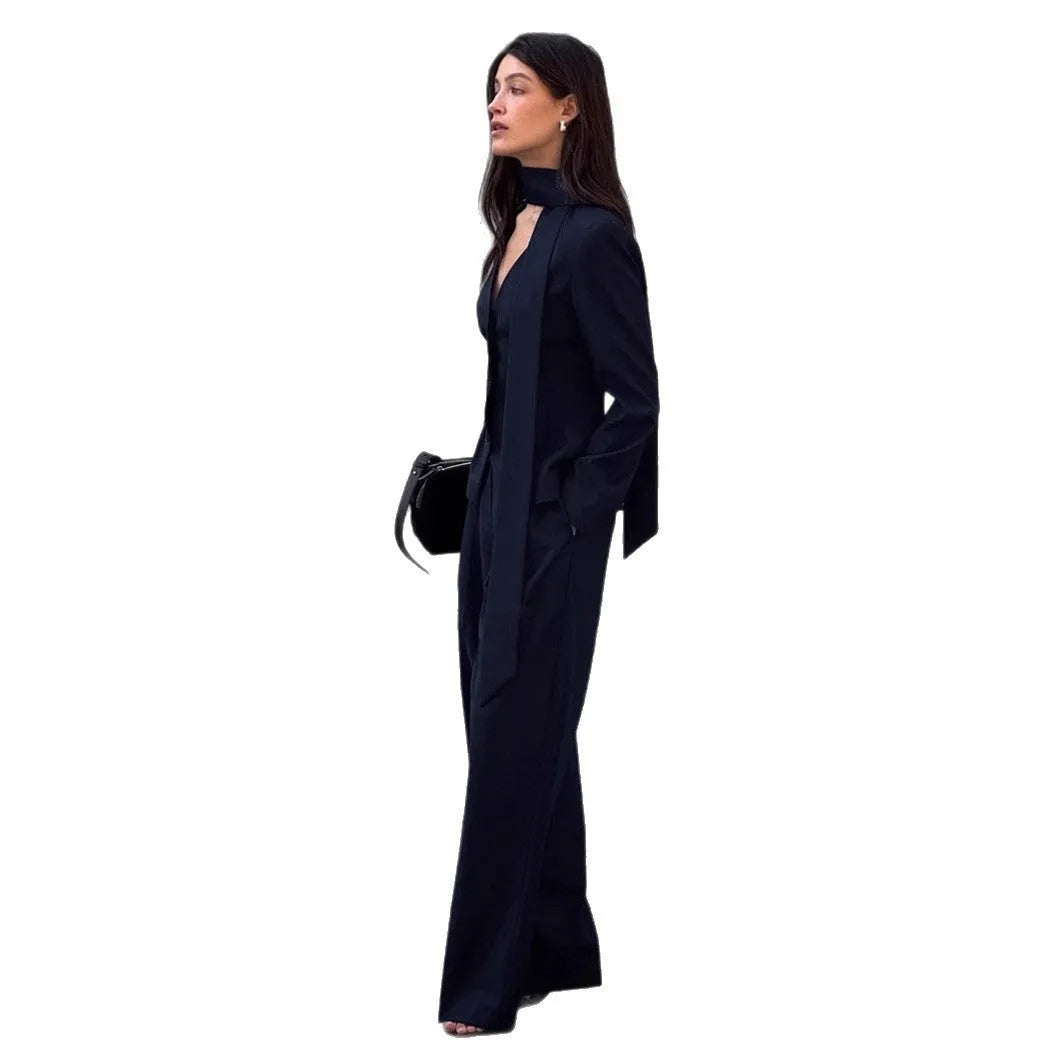 Women's navy blue halter suit set with polyester top and full-length trousers in sizes S M L