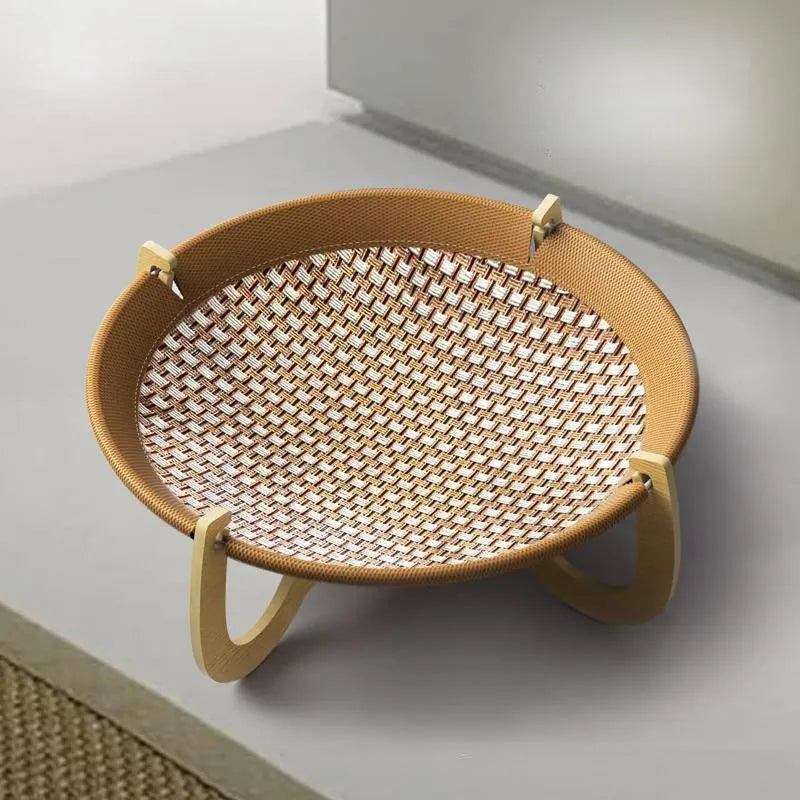 Brown woven rattan hammock pet bed measuring 46cm square with elevated design
