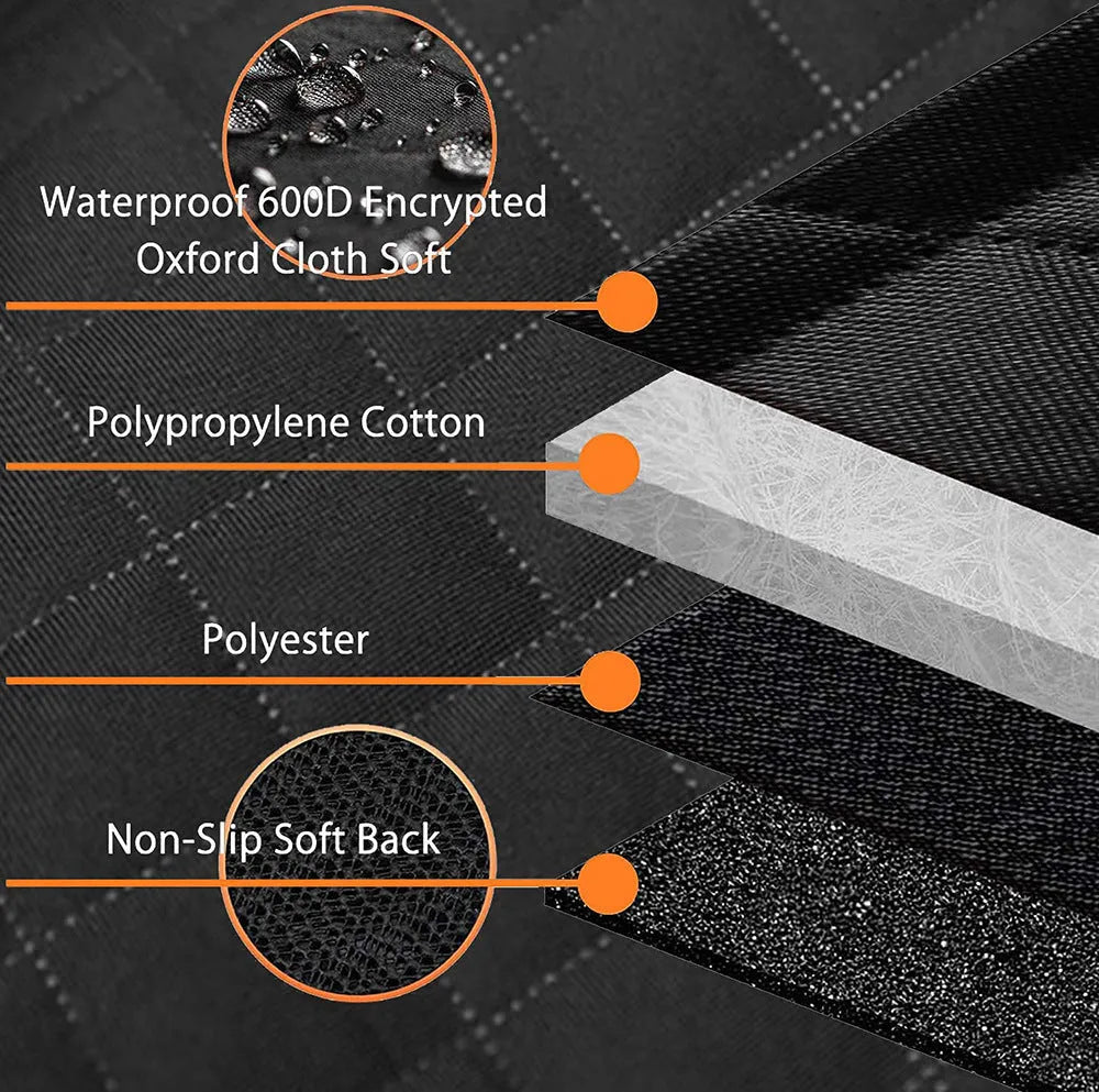 Black dog car seat cover with orange edging on a rear car seat, showing mesh window and storage pocket.