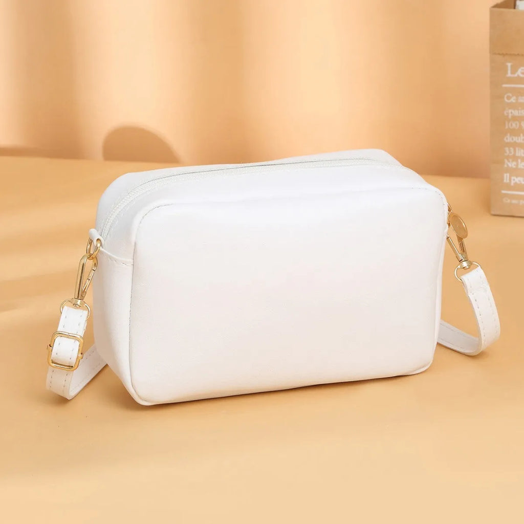 Solid-colour women's PU shoulder bag with three-dimensional pocket and horizontal square shape