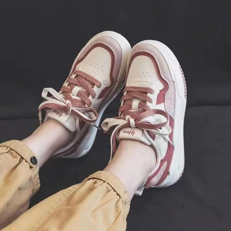 Low top rubber sneaker in pink or milky white with height increasing sole and breathable design