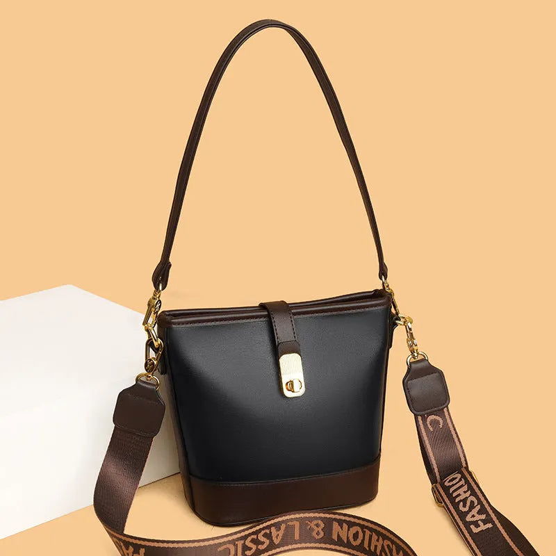 Korean style soft PU leather bucket bag with double shoulder straps in black colour showing internal organisation compartments