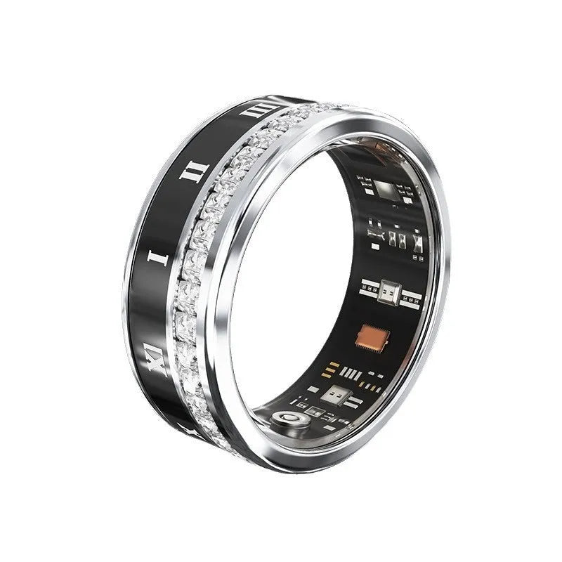Gold and silver diamond inlaid smart ring for health monitoring on a finger.