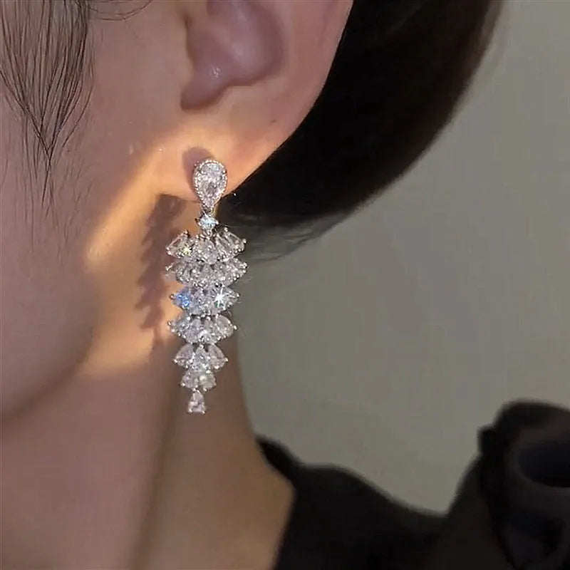 Silver pagoda Christmas tree drop earrings with sparkling zircon detailing and stud fastening
