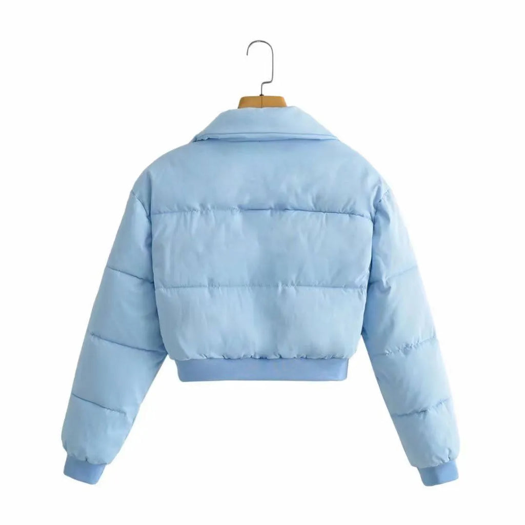 Loose fit women's polyester jacket in beige, black, or blue colour with long sleeves.