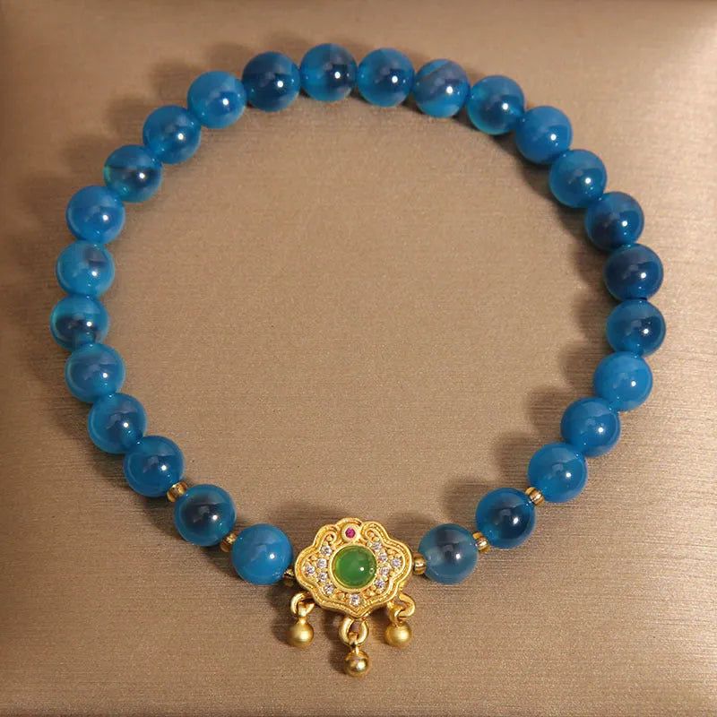 Women's blue sugar heart agate crystal pendant bracelet with safety lock clasp and rhinestone decorative elements