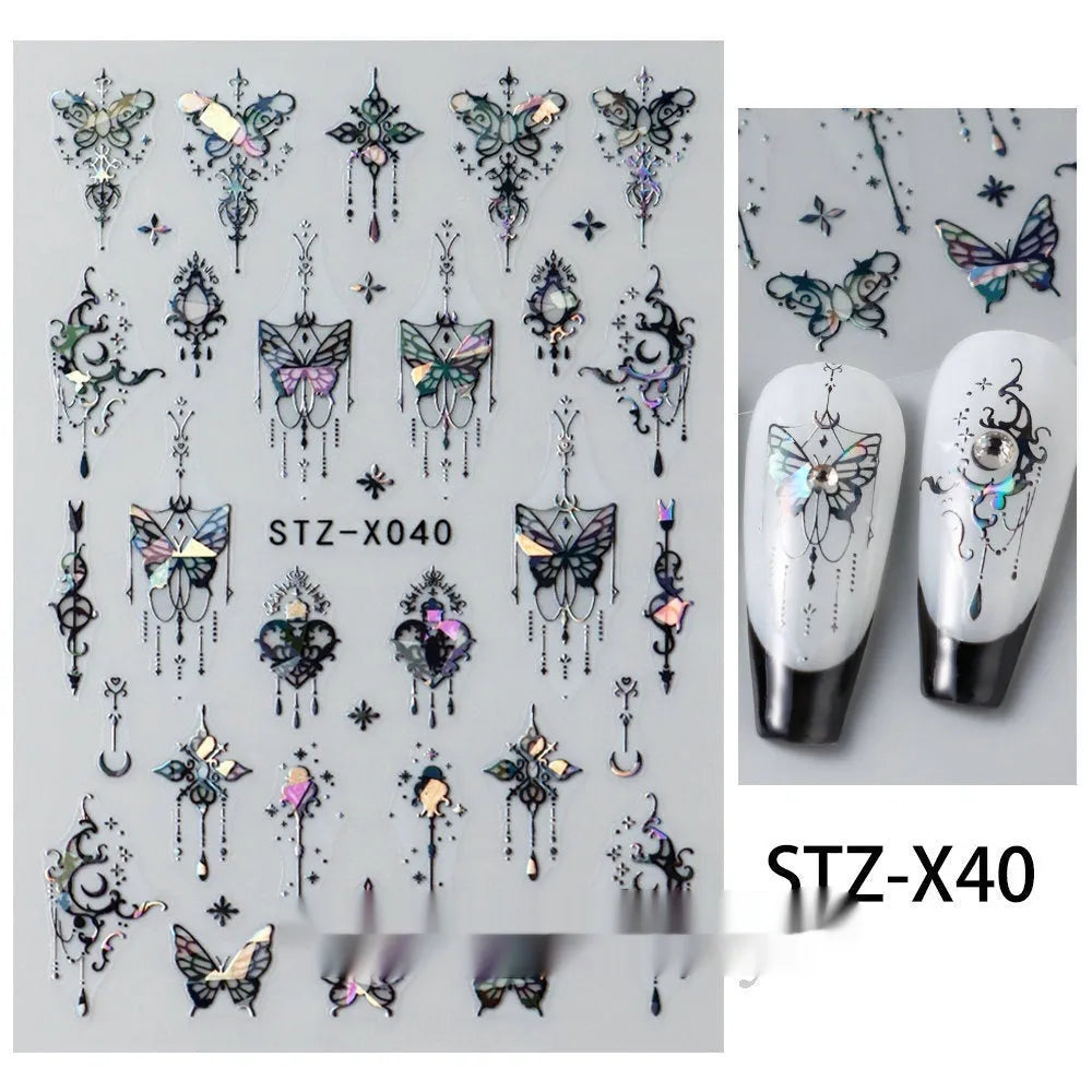 Cartoon love pattern nail art sticker decals in black and silver colours on a plastic sheet.