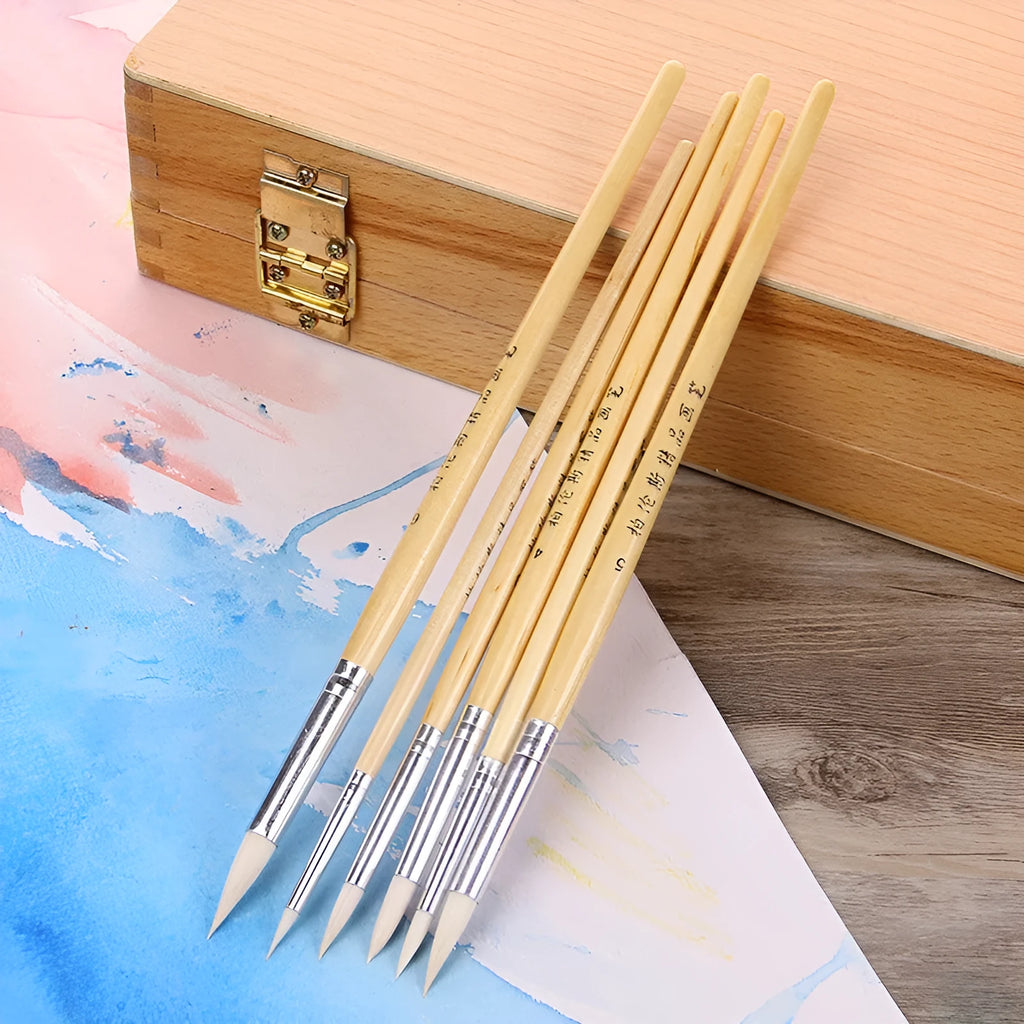 Six wooden-handled artistic brushes with wool-pointed tips for textile and embroidery crafts.