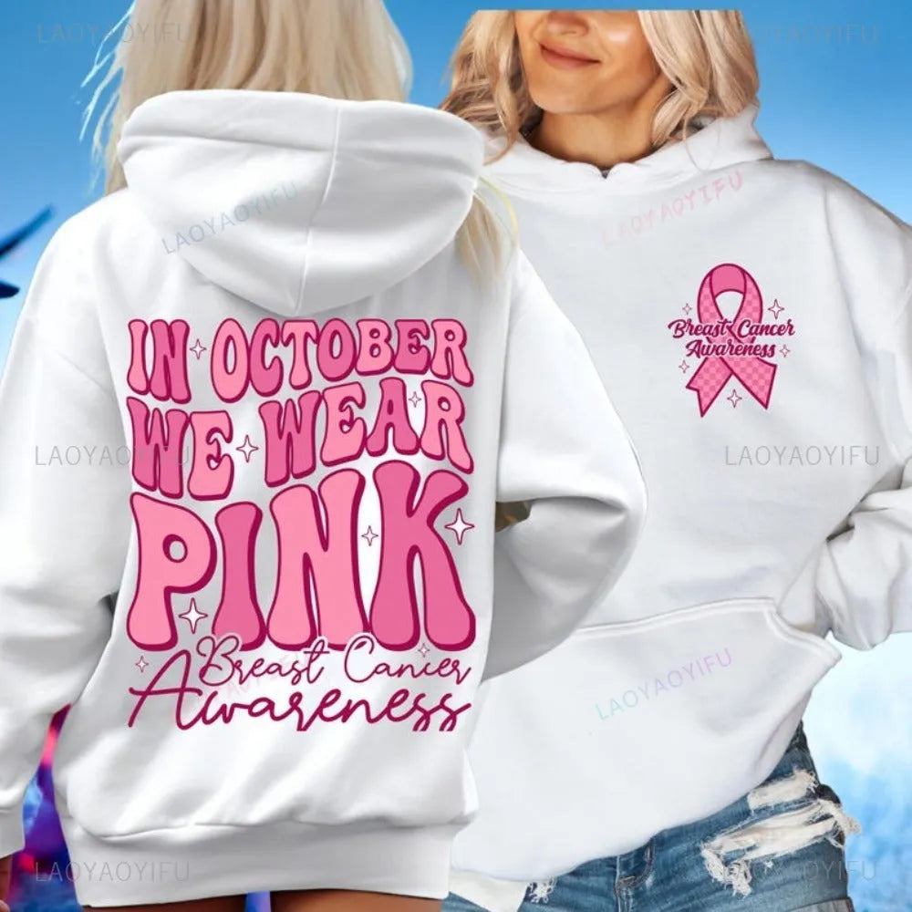 Breast cancer awareness pullover hoodie with retro art print in pink, featuring side seam pockets.