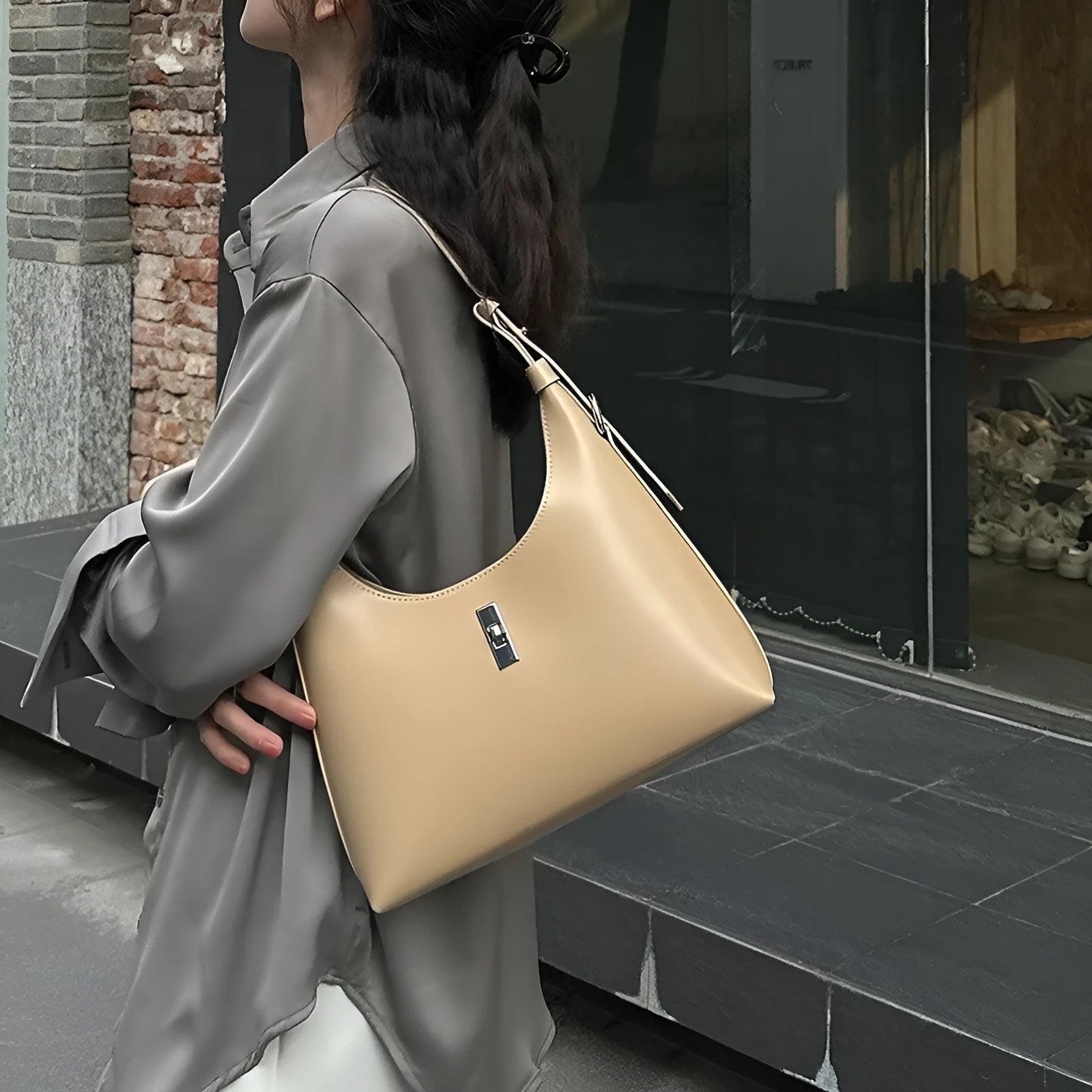 Genuine leather crossbody shoulder bag with dumpling shape and sandwich pocket design