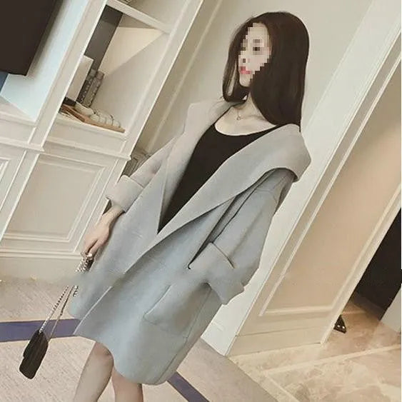 Plus size women's loose fit cotton coat with lace detail in grey, shown on a model.