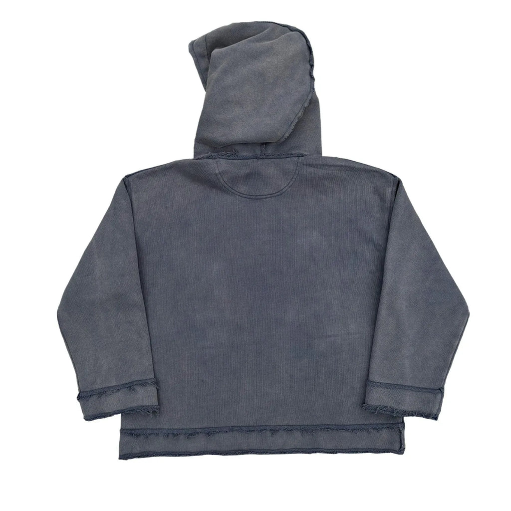 Man wearing a dark blue full zip hoodie sweater.