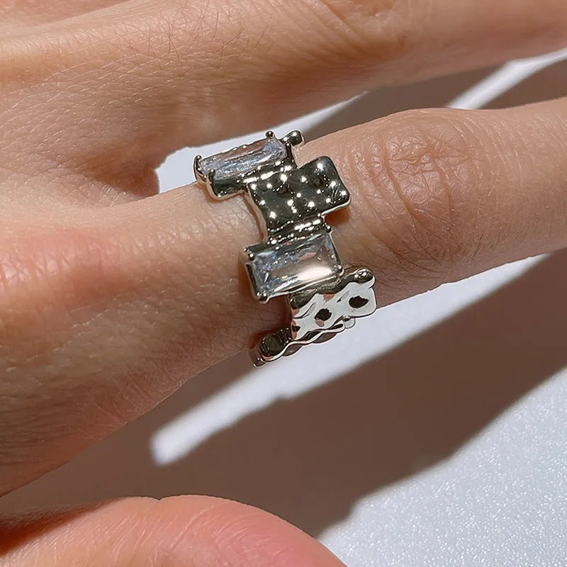 Geometric open silver ring with cross zircon decoration in retro style
