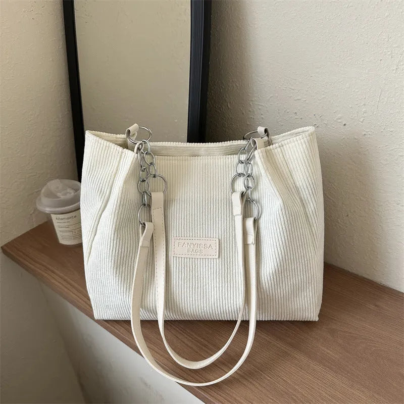 Corduroy one-shoulder tote handbag with three-dimensional pocket in street trend style