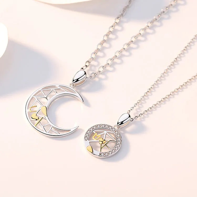 Sun Moon Tooth Couple Necklace showing electroplated copper pendant with cross chain