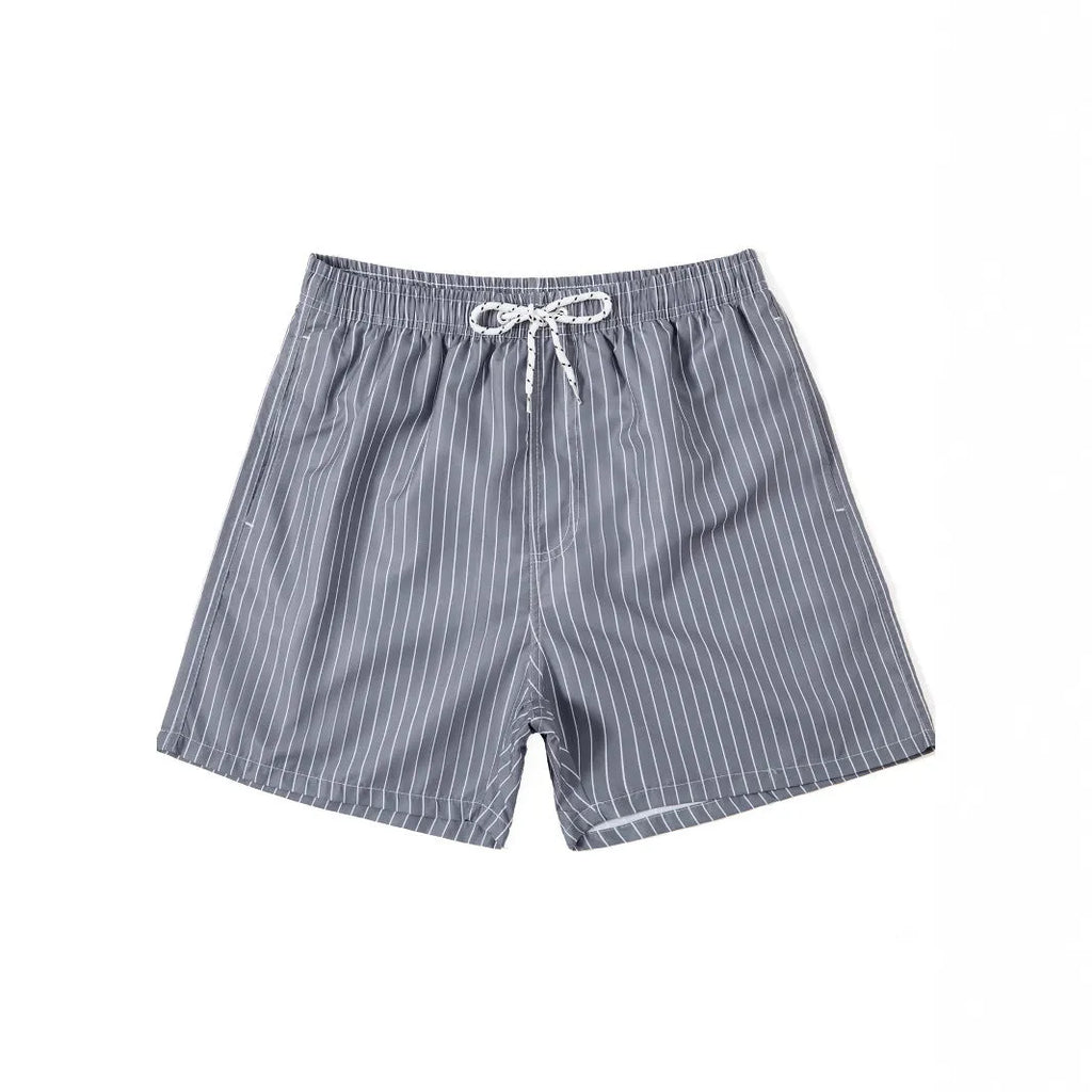 Men's striped polyester beach shorts in grey, shown with a straight leg fit and triangle lining detail.