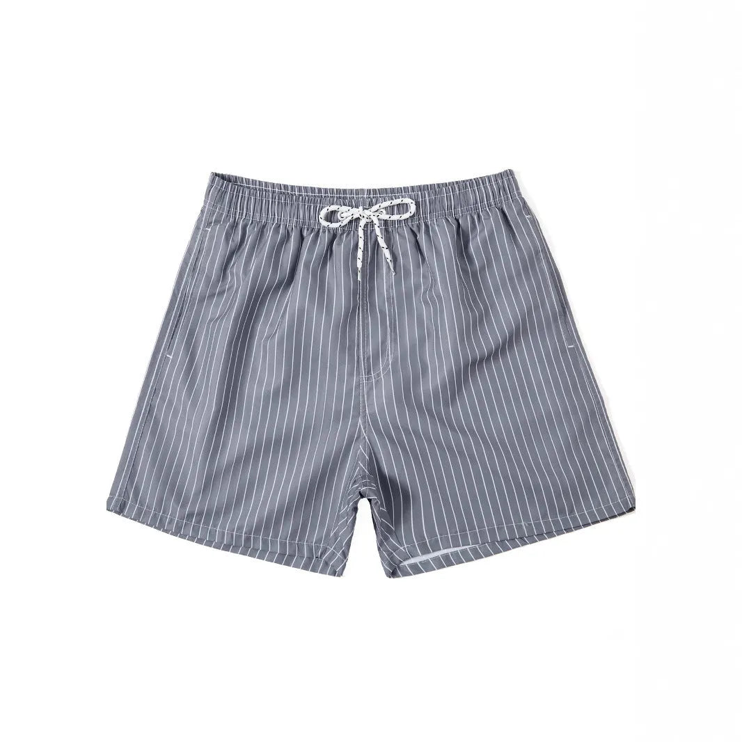 Men's striped polyester beach shorts in grey, shown with a straight leg fit and triangle lining detail.